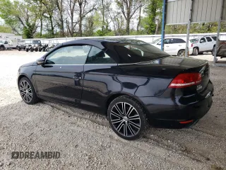 2013 Volkswagen Eos Komfort with VIN WVWBW8AH1DV001953, listed as a Copart auction lot 54167185 with 118,696 mi miles and Clean Title. Bid and sale history available at DreamBid. Image 2.