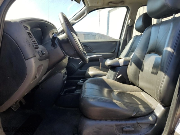 2004 Mazda Tribute ES with VIN 4F2CZ06104KM02999, listed as a Copart auction lot 47289025 with 150,883 mi miles and Salvage Title. Bid and sale history available at carsss.com. Image 7.