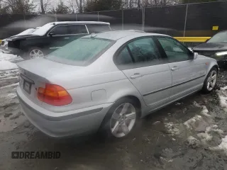 2004 BMW 3 Series 325i with VIN WBAET37464NH04736, listed as a Copart auction lot 44700895 with 219,460 mi miles and Salvage Title. Bid and sale history available at carsss.com. Image 3.