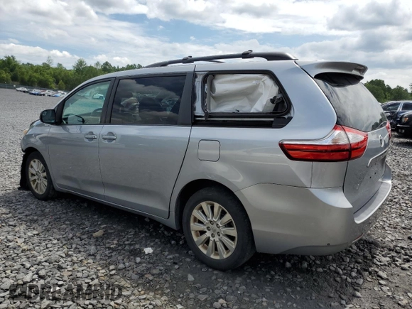 2015 Toyota Sienna LE with VIN 5TDJK3DC8FS104777, listed as a Copart auction lot 63440925 with 195,962 mi miles and Salvage title. Bid and sale history available at DreamBid. Image 2.