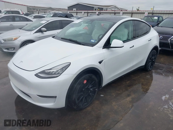 2022 Tesla Model Y Long Range z VIN 7SAYGDEE2NF420882, wystawiony jako IAAI lot #42023642 z przebiegiem 19 783 mil mil oraz . Historia ofert i sprzedaży dostępna na DreamBid. Obrazek 21.