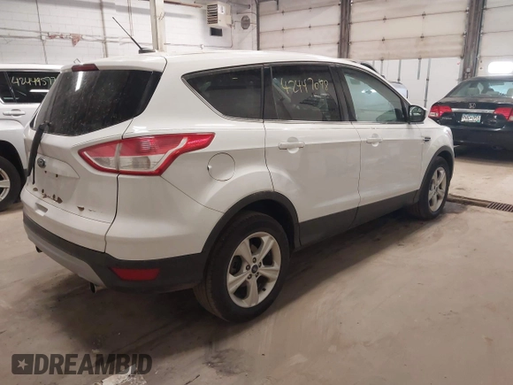 2013 Ford Escape SE with VIN 1FMCU0GX5DUA74237, listed as a IAAI auction lot 42447048 with 140,732 mi miles and . Bid and sale history available at DreamBid. Image 4.