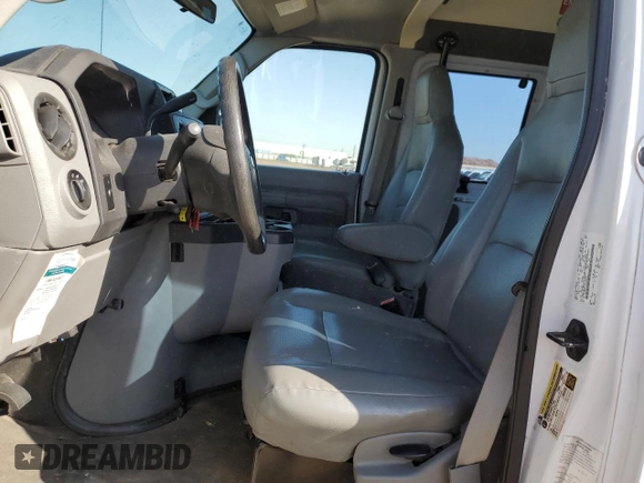 2014 Ford Econoline Cargo Commercial with VIN 1FTNS2EWXEDA39249, listed as a Copart auction lot 68464544 with 69,596 mi miles and Clean Title. Bid and sale history available at carsss.com. Image 7.