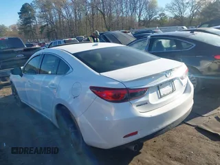 2015 Mazda 6 i Grand Touring with VIN JM1GJ1W54F1202766, listed as a IAAI auction lot 41860197 with Not Provided miles and . Bid and sale history available at DreamBid. Image 3.
