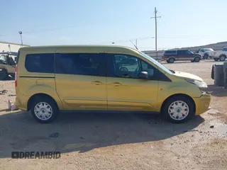 2014 Ford Transit Connect XLT z VIN NM0GE9F7XE1138328, wystawiony jako IAAI lot #42021585 z przebiegiem 294 791 mil mil oraz . Historia ofert i sprzedaży dostępna na DreamBid. Obrazek 14.