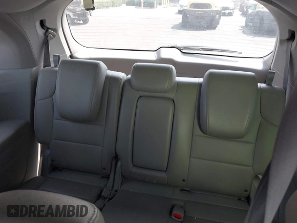 2012 Honda Odyssey Touring с VIN 5FNRL5H91CB004546, выставлен на аукционе IAAI как лот 42175002 с пробегом 118 719 миль миль и . История ставок и продаж доступна на DreamBid. Изображение 17.