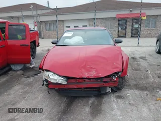 2004 Chevrolet Monte Carlo SS Supercharged z VIN 2G1WZ151349181767, wystawiony jako IAAI lot #41128408 z przebiegiem 231 350 mil mil oraz . Historia ofert i sprzedaży dostępna na DreamBid. Obrazek 12.