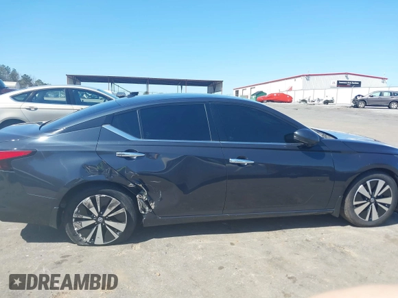 2019 Nissan Altima 2.5 Platinum with VIN 1N4BL4FV2KC113644, listed as a IAAI auction lot 41751975 with 125,617 mi miles. Bid and sale history available at carsss.com. Image 13.