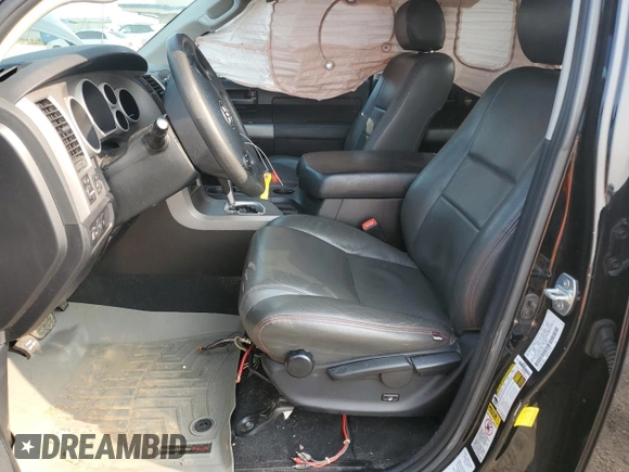 2012 Toyota Tundra with VIN 5TFUW5F10CX213930, listed as a Copart auction lot 60213445 with 147,371 mi miles and Salvage title. Bid and sale history available at DreamBid. Image 7.