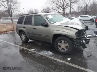 2004 Chevrolet TrailBlazer LS with VIN 1GNDS13S242128997, listed as a IAAI auction lot 41481386 with 1 mi miles. Bid and sale history available at carsss.com. Image 1.