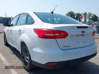 2016 Ford Focus SE with VIN 1FADP3F20GL329898, listed as a IAAI auction lot 42844995 with 20,485 mi miles and . Bid and sale history available at DreamBid. Image 3.