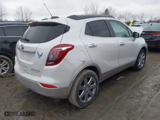 2019 Buick Encore Essence with VIN KL4CJCSM2KB734927, listed as a IAAI auction lot 41470478 with 137,459 mi miles. Bid and sale history available at carsss.com. Image 4.