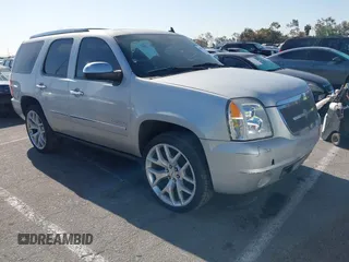 2011 GMC Yukon Denali with VIN 1GKS2EEF3BR350688, listed as a IAAI auction lot 41993776 with 241,941 mi miles. Bid and sale history available at carsss.com. Image 1.