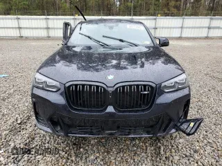 2024 BMW X4 M40i z VIN 5UX43DT09R9U93650, wystawiony jako Copart lot #50173205 z przebiegiem Nie podano mil oraz Szkody całkowita. Historia ofert i sprzedaży dostępna na DreamBid. Obrazek 5.