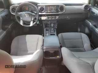 2018 Toyota Tacoma SR5 z VIN 3TMAZ5CN8JM077857, wystawiony jako Copart lot #52570945 z przebiegiem 50 182 mil mil oraz Szkoda całkowita • Salvage title. Historia ofert i sprzedaży dostępna na DreamBid. Obrazek 8.
