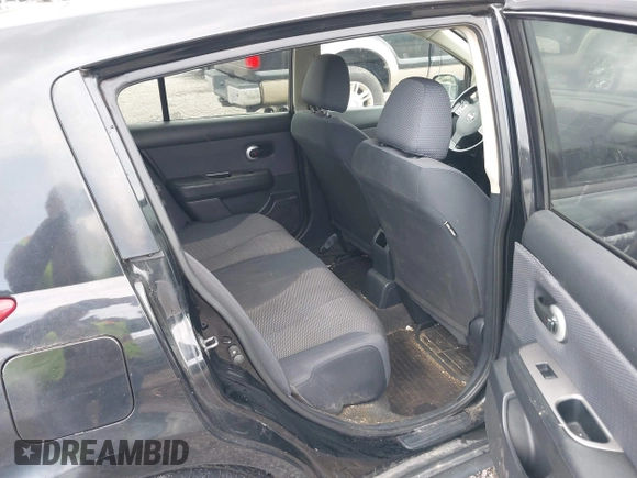 2009 Nissan Versa 1.8 S with VIN 3N1BC13E79L354341, listed as a IAAI auction lot 42079896 with 118,797 mi miles. Bid and sale history available at carsss.com. Image 8.