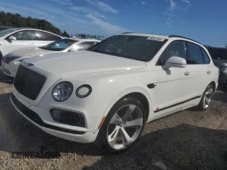 2018 Bentley Bentayga Signature z VIN SJAAC4ZV7JC017462, wystawiony jako Copart lot #79297984 z przebiegiem Nie podano mil oraz Nie do naprawy. Historia ofert i sprzedaży dostępna na DreamBid. Obrazek 1.