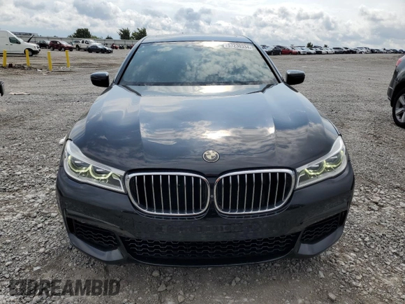 2016 BMW 7 Series 750i with VIN WBA7F0C53GGM20760, listed as a Copart auction lot 57230334 with 77,588 mi miles and Salvage Title. Bid and sale history available at carsss.com. Image 5.