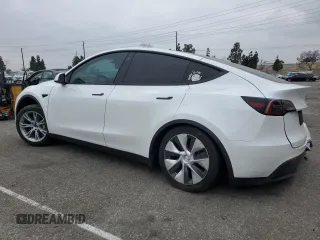2022 Tesla Model Y Long Range z VIN 7SAYGDEE5NF352075, wystawiony jako Copart lot #50799895 z przebiegiem 11 597 mil mil oraz Szkoda całkowita • Salvage title. Historia ofert i sprzedaży dostępna na DreamBid. Obrazek 2.