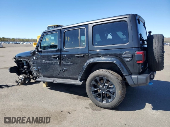 2023 Jeep Wrangler Sahara z VIN 1C4JJXP66PW605961, wystawiony jako Copart lot #50209655 z przebiegiem 32 805 mil mil oraz Szkoda całkowita • Salvage title. Historia ofert i sprzedaży dostępna na DreamBid. Obrazek 2.