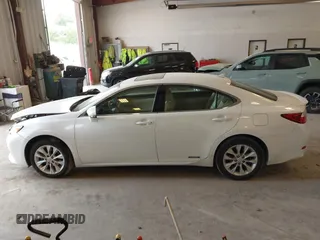 2014 Lexus ES 300h with VIN JTHBW1GG2E2067189, listed as a IAAI auction lot 42404843 with 182,798 mi miles and . Bid and sale history available at DreamBid. Image 14.