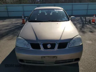 2004 Suzuki Forenza S z VIN KL5JD52Z54K991570, wystawiony jako Copart lot #49380694 z przebiegiem 98 943 mil mil oraz Szkody całkowita. Historia ofert i sprzedaży dostępna na DreamBid. Obrazek 5.