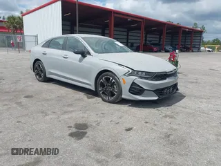 2024 Kia K5 GT-Line z VIN 5XXG64J29RG243547, wystawiony jako IAAI lot #42149426 z przebiegiem 21 304 mil mil oraz . Historia ofert i sprzedaży dostępna na DreamBid. Obrazek 1.