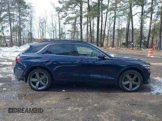 2022 Genesis GV70 Sport z VIN KMUMCDTC3NU074029, wystawiony jako IAAI lot #41400987 z przebiegiem 29 494 mil mil oraz . Historia ofert i sprzedaży dostępna na DreamBid. Obrazek 13.