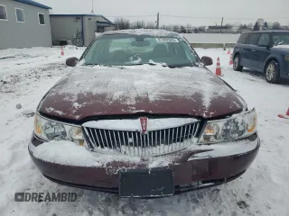 2002 Lincoln Continental with VIN 1LNHM97V62Y684873, listed as a Copart auction lot 87602665 with 52,974 mi miles and Salvage Title. Bid and sale history available at carsss.com. Image 5.