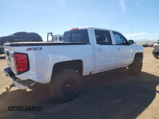 2016 Chevrolet Silverado 1500 LT with VIN 3GCUKREC7GG315533, listed as a Copart auction lot 50883675 with 156,035 mi miles and Salvage Title. Bid and sale history available at DreamBid. Image 3.