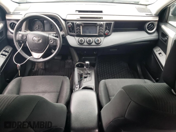 2018 Toyota RAV4 LE with VIN 2T3BFREV3JW764258, listed as a Copart auction lot 61234155 with Not provided miles and Salvage title. Bid and sale history available at DreamBid. Image 8.