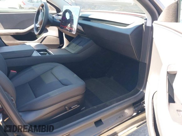 2025 Tesla Model 3 Long Range with VIN 5YJ3E1EA5SF919681, listed as a IAAI auction lot 41818042 with 2,173 mi miles and . Bid and sale history available at DreamBid. Image 5.