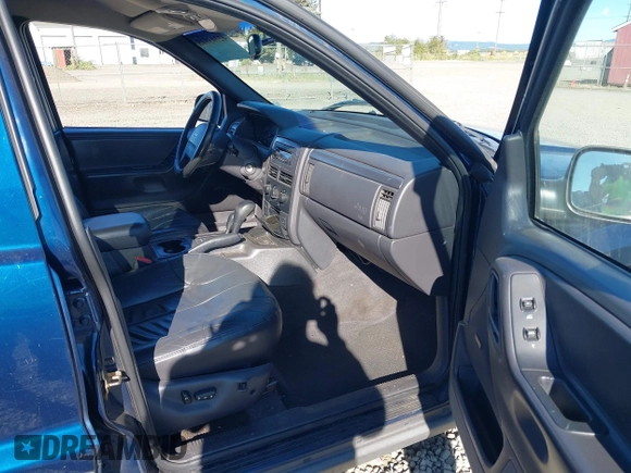 2001 Jeep Grand Cherokee Laredo with VIN 1J4GW48N31C727194, listed as a IAAI auction lot 42703915 with 176,896 mi miles and . Bid and sale history available at DreamBid. Image 5.