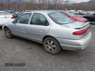1998 Mercury Mystique z VIN 3MEFM66L2WM611980, wystawiony jako IAAI lot #41391920 z przebiegiem 199 491 mil mil oraz . Historia ofert i sprzedaży dostępna na DreamBid. Obrazek 3.