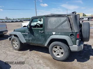 2009 Jeep Wrangler X with VIN 1J4FA24169L711018, listed as a IAAI auction lot 42178480 with 195,611 mi miles and . Bid and sale history available at DreamBid. Image 14.