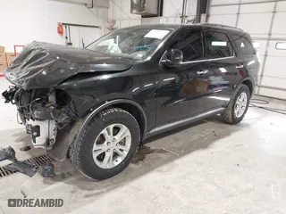 2013 Dodge Durango Crew with VIN 1C4SDJDT9DC670738, listed as a IAAI auction lot 41329419 with 149,520 mi miles. Bid and sale history available at carsss.com. Image 2.