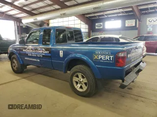 2002 Ford Ranger XL Fleet with VIN 1FTZR45E22TA06974, listed as a Copart auction lot 58312585 with 156,828 mi miles and Salvage title. Bid and sale history available at DreamBid. Image 2.