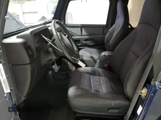 2002 Jeep Wrangler Sport with VIN 1J4FA49S82P703420, listed as a Copart auction lot 53322175 with 87,642 mi miles and Salvage Title. Bid and sale history available at carsss.com. Image 7.