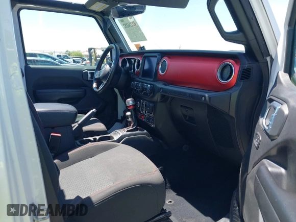 2021 Jeep Wrangler Unlimited Rubicon with VIN 1C4HJXFGXMW850556, listed as a IAAI auction lot 42234282 with 80,834 mi miles and . Bid and sale history available at DreamBid. Image 5.