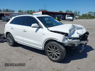 2018 Audi Q3 Premium Plus z VIN WA1JCCFS3JR028436, wystawiony jako IAAI lot #42067256 z przebiegiem 63 722 mil mil oraz . Historia ofert i sprzedaży dostępna na DreamBid. Obrazek 1.