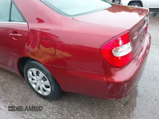 2003 Toyota Camry LE with VIN JTDBE32K630159278, listed as a IAAI auction lot 42148712 with 184,999 mi miles and . Bid and sale history available at DreamBid. Image 6.