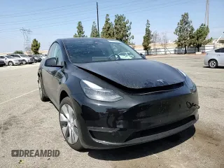 2024 Tesla Model Y Long Range with VIN 7SAYGDEE6RA219456, listed as a Copart auction lot 61855165 with 29,869 mi miles and Salvage title. Bid and sale history available at DreamBid. Image 14.