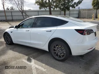 2023 Tesla Model 3 with VIN 5YJ3E1EA5PF486726, listed as a Copart auction lot 51659655 with 14,632 mi miles and Salvage title. Bid and sale history available at DreamBid. Image 2.