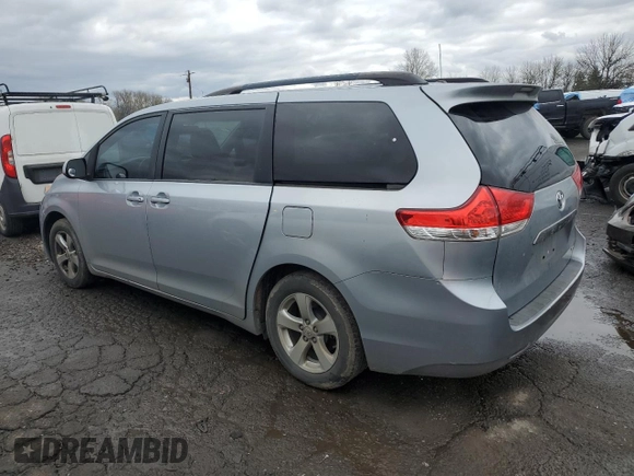 2014 Toyota Sienna LE AAS with VIN 5TDKK3DC3ES459861, listed as a Copart auction lot 47393485 with 144,520 mi miles and Salvage title. Bid and sale history available at DreamBid. Image 2.