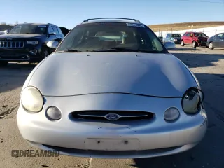 1999 Ford Taurus SE with VIN 1FAFP58U5XG240517, listed as a Copart auction lot 83514044 with 101,092 mi miles and Clean title. Bid and sale history available at DreamBid. Image 5.