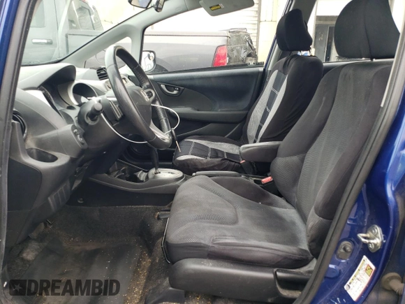 2009 Honda Fit Sport z VIN JHMGE88419S039797, wystawiony jako Copart lot #56866245 z przebiegiem 162 896 mil mil oraz Szkoda całkowita • Salvage title. Historia ofert i sprzedaży dostępna na DreamBid. Obrazek 7.