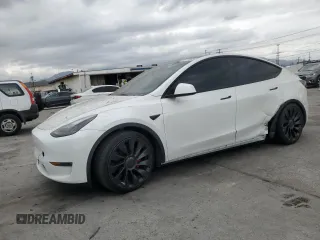 2023 Tesla Model Y Performance z VIN 7SAYGDEFXPF801908, wystawiony jako Copart lot #50737655 z przebiegiem Nie podano mil oraz Szkoda całkowita • Salvage title. Historia ofert i sprzedaży dostępna na DreamBid. Obrazek 1.
