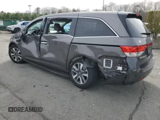 2015 Honda Odyssey Touring Elite with VIN 5FNRL5H95FB117971, listed as a Copart auction lot 52083475 with 82,626 mi miles and Salvage Title. Bid and sale history available at DreamBid. Image 2.