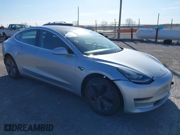 2018 Tesla Model 3 Long Range Battery with VIN 5YJ3E1EB9JF065057, listed as a IAAI auction lot 41863903 with 54,584 mi miles and . Bid and sale history available at DreamBid. Image 1.