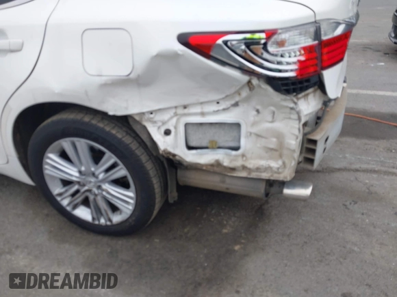 2015 Lexus ES 330 with VIN JTHBK1GG7F2194274, listed as a IAAI auction lot 41553276 with 133,899 mi miles and . Bid and sale history available at DreamBid. Image 6.
